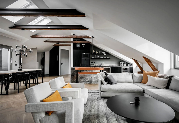 Стильный интерьер просторной мансардной квартиры в Стокгольме