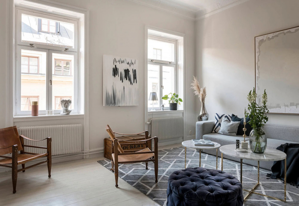 Стильная квартира в Стокгольме с лепниной и индустриальными элементами (53 кв. м)