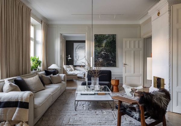 Современная классика со стильными тёмными акцентами: квартира в Стокгольме