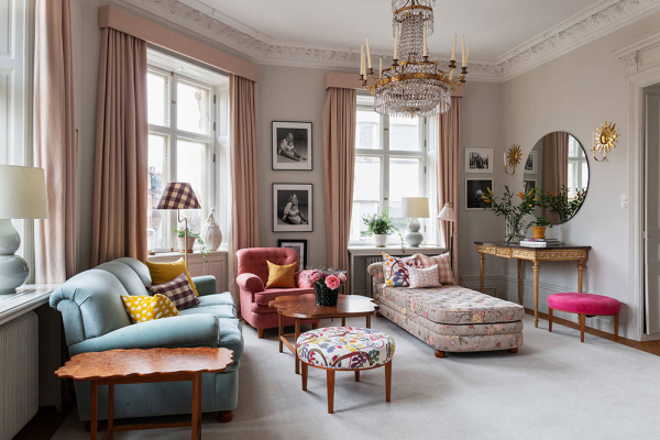 Приятные женственные нотки в дизайне элегантной скандинавской квартиры