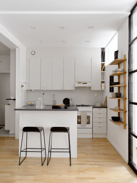 Мягкий минимализм и стеклянная перегородка: маленькая квартира в Стокгольме (39 кв. м)